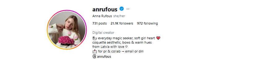 An Instagram bio example of a digital creator named Anna Rufous showing a soft girl coquette aesthetic with a clear call to action for PR and collaborations.